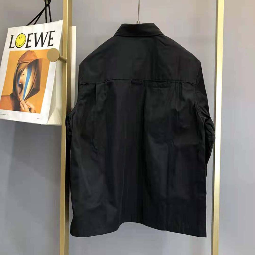 Side angle showing oversized silhouette of Prada Women Defined by an Oversized Fit and Large Patch Pocket with Strap Re-Nylon Shirt