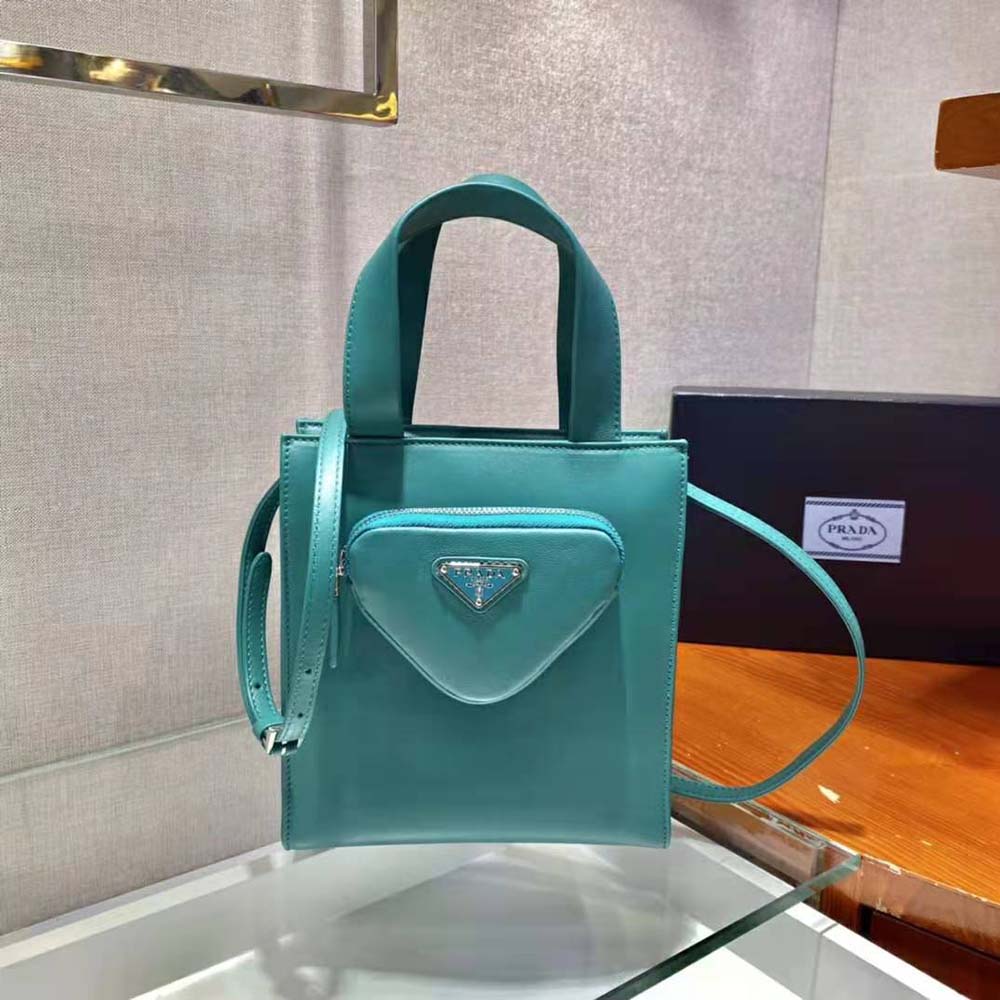 Close-up of lime nappa leather texture and zipper on Prada tote bag