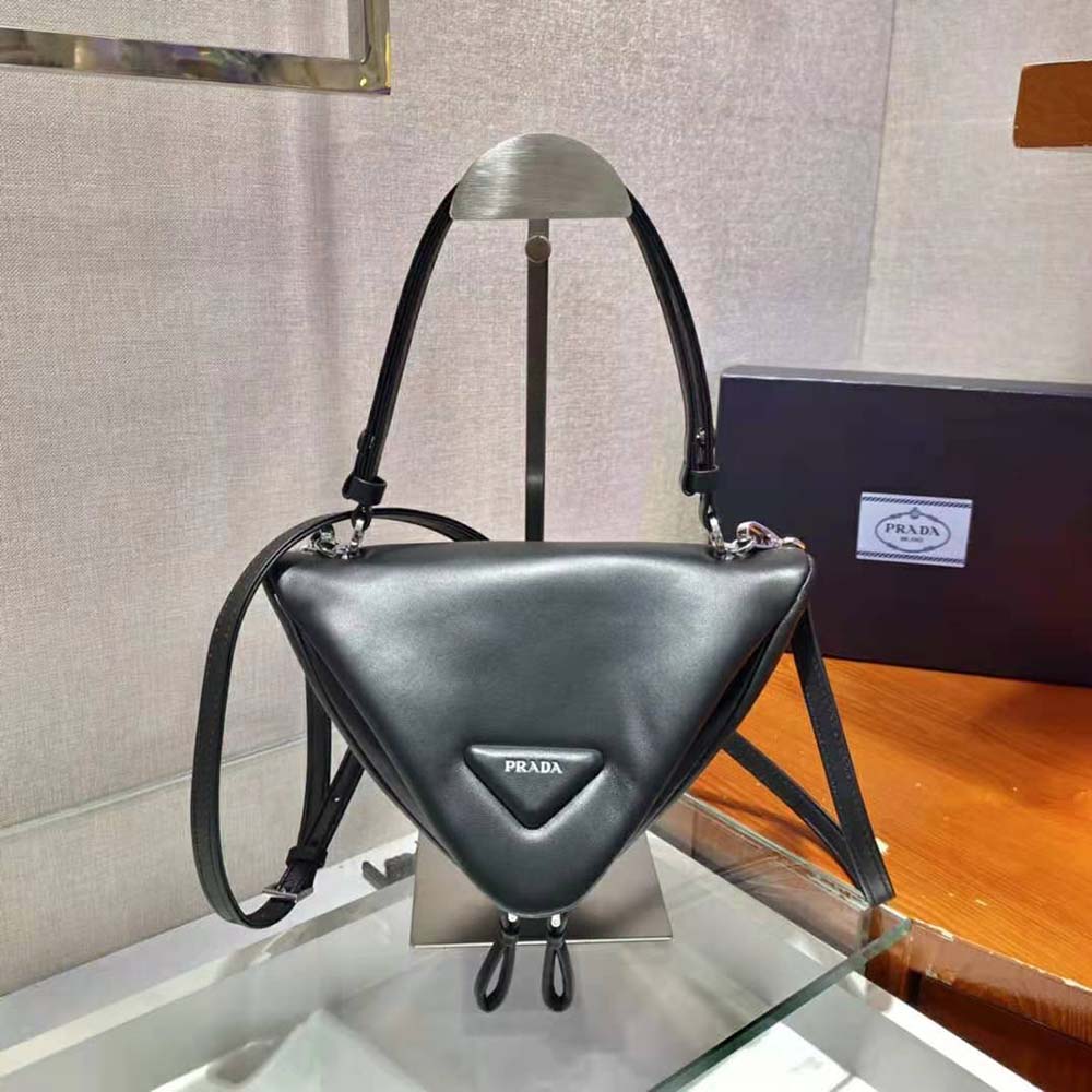 Side profile of Prada Women Padded Nappa Leather Handbag-Black highlighting structured silhouette