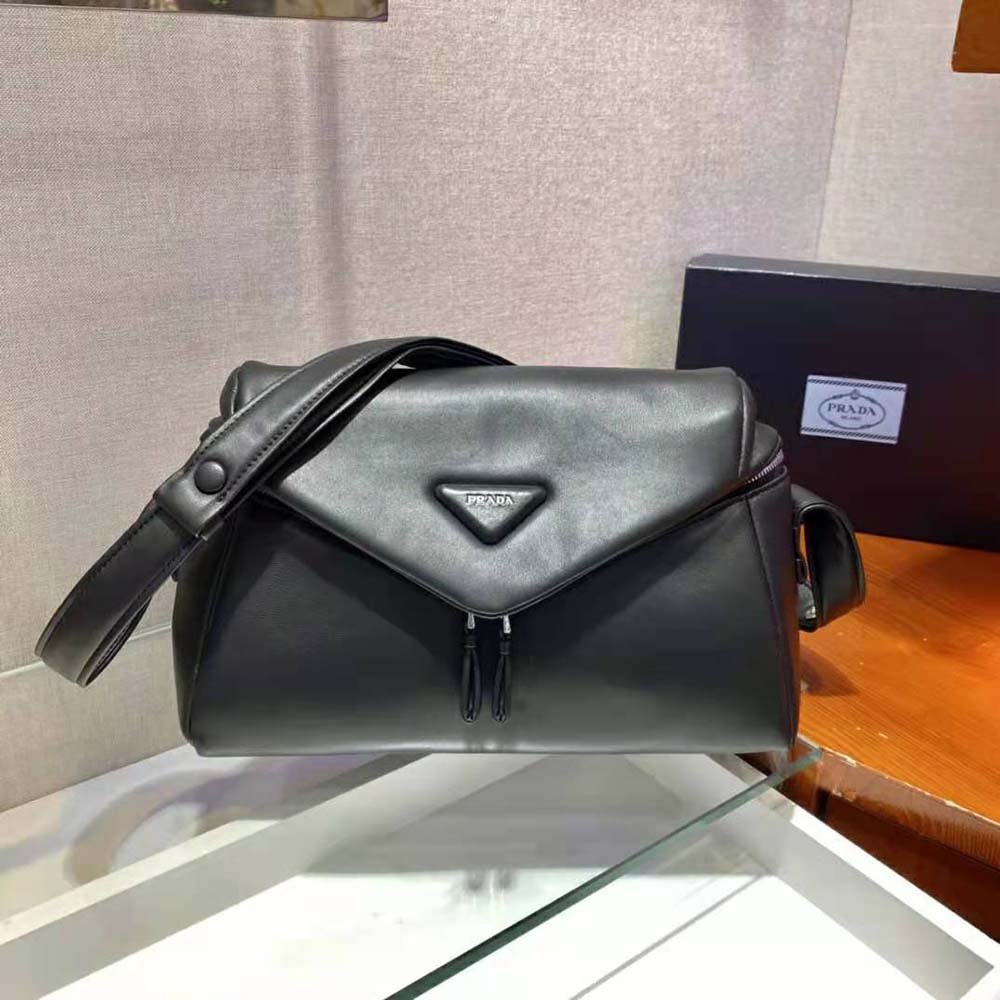 Close-up of gold-tone Prada logo on Prada Signaux Bag-Black