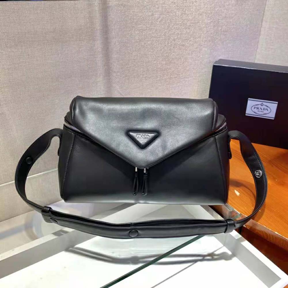 Side angle showing padded texture of Prada Signaux Bag-Black