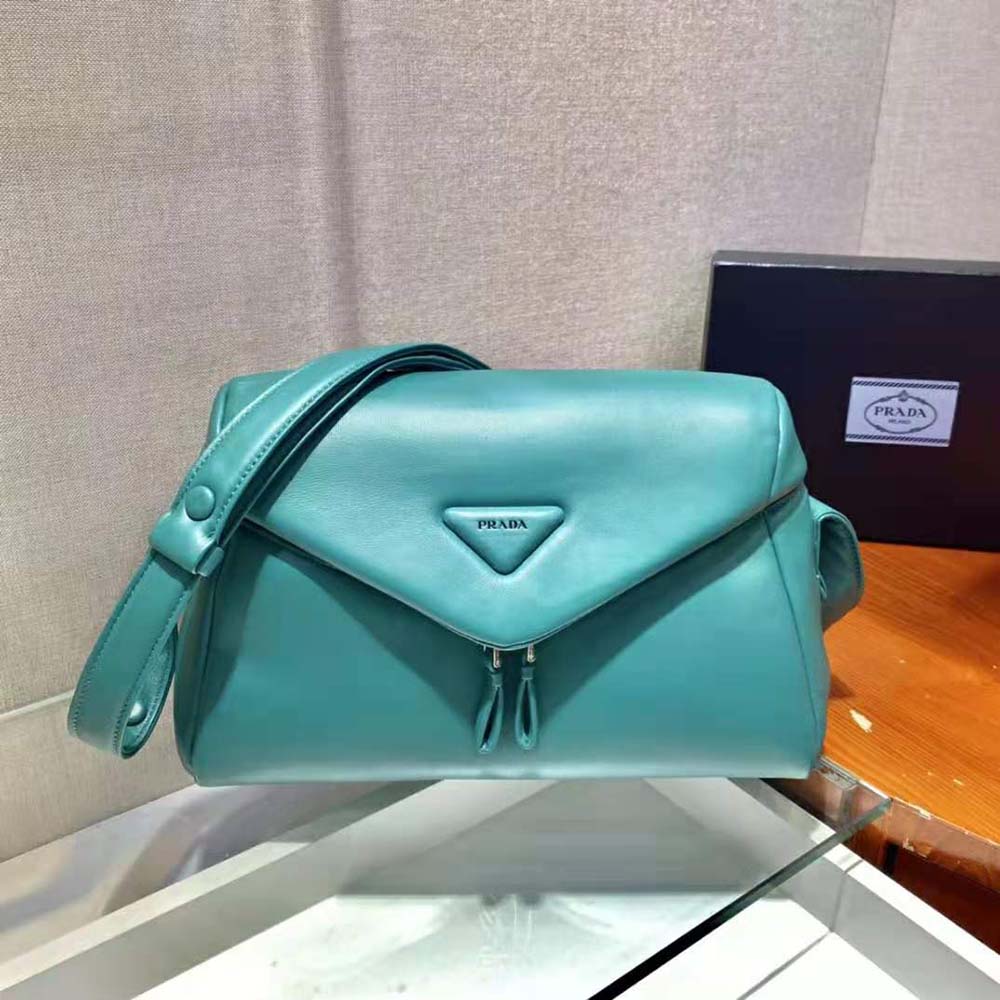Side angle of Prada Women Padded Nappa Leather Prada Signaux Bag-Lime displaying zip closure