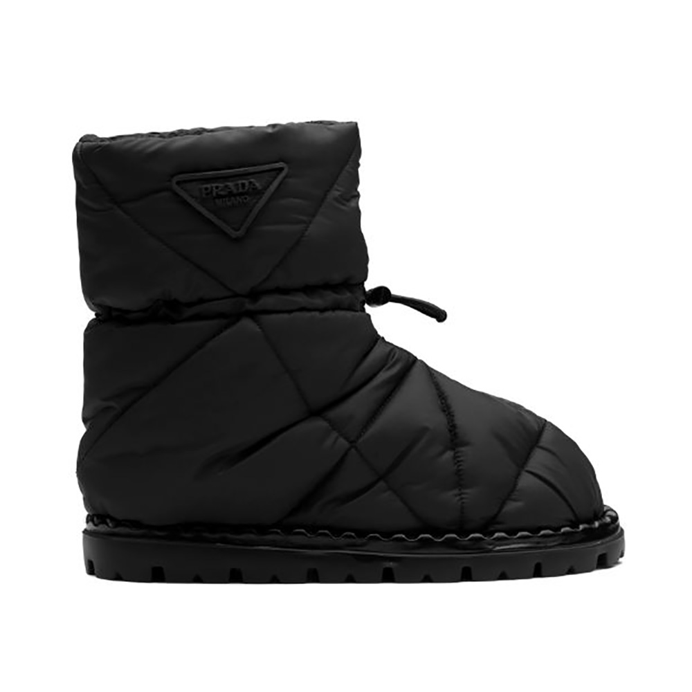 Side profile of Prada Women Padded Nylon Booties-Black showing silhouette