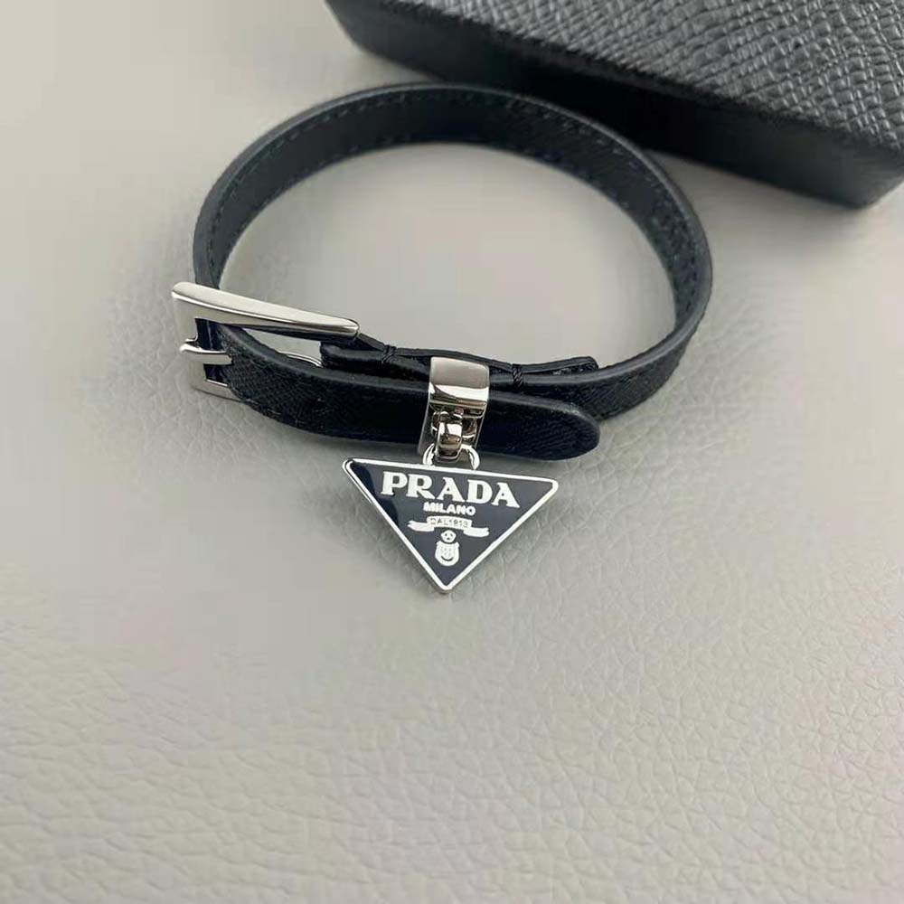Side view of Prada Women Saffiano Leather Bracelet-Black with silver hardware detail