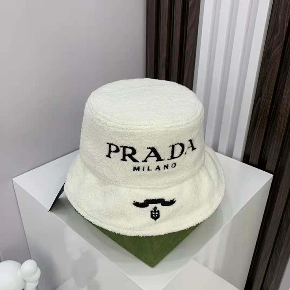 Side profile of Prada Women Terrycloth Bucket Hat-White highlighting silhouette