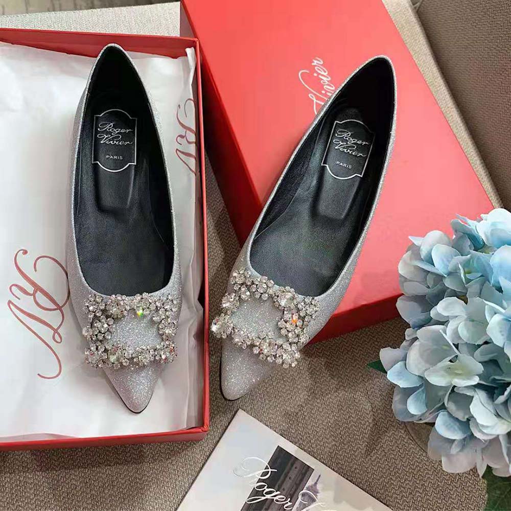 Close-up of flower strass buckle detail on Roger Vivier pumps