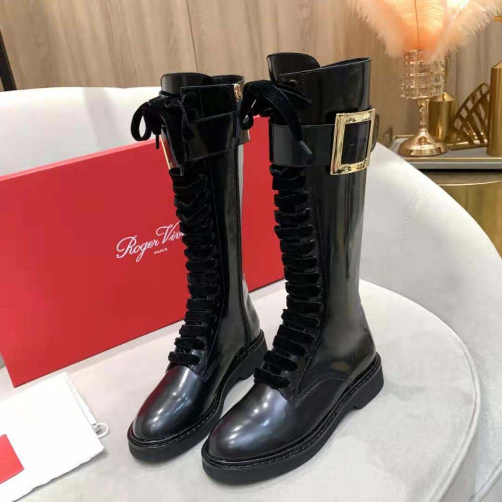 Close-up of metal buckle detail on Roger Vivier Women Rangers Lace Up Metal Buckle Boots