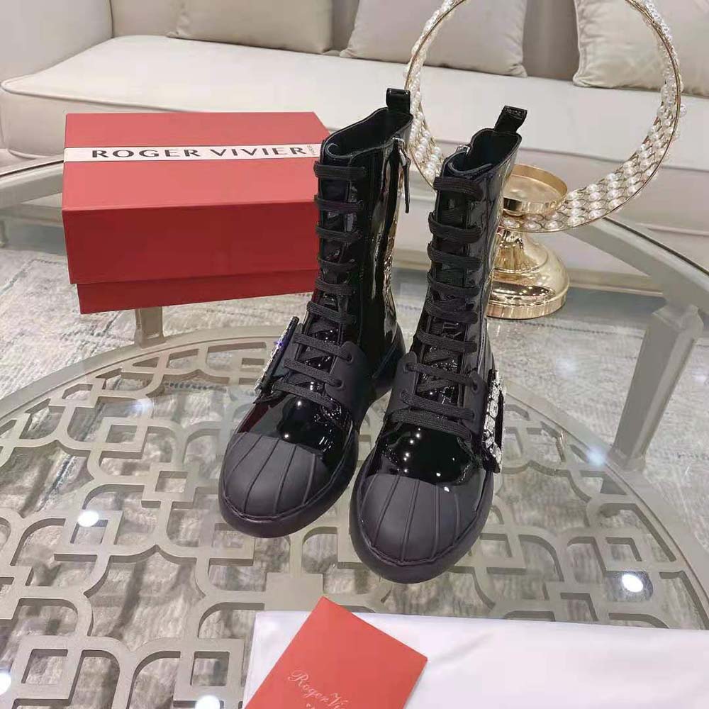 Close-up of sparkling strass buckle on Roger Vivier Lace Up Booties
