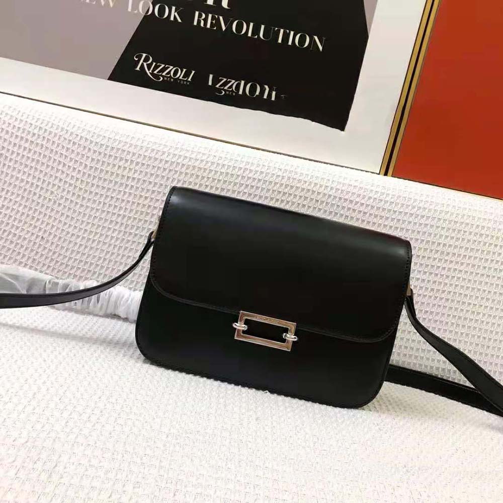 Close-up of gold pavé YSL hardware on Saint Laurent satchel
