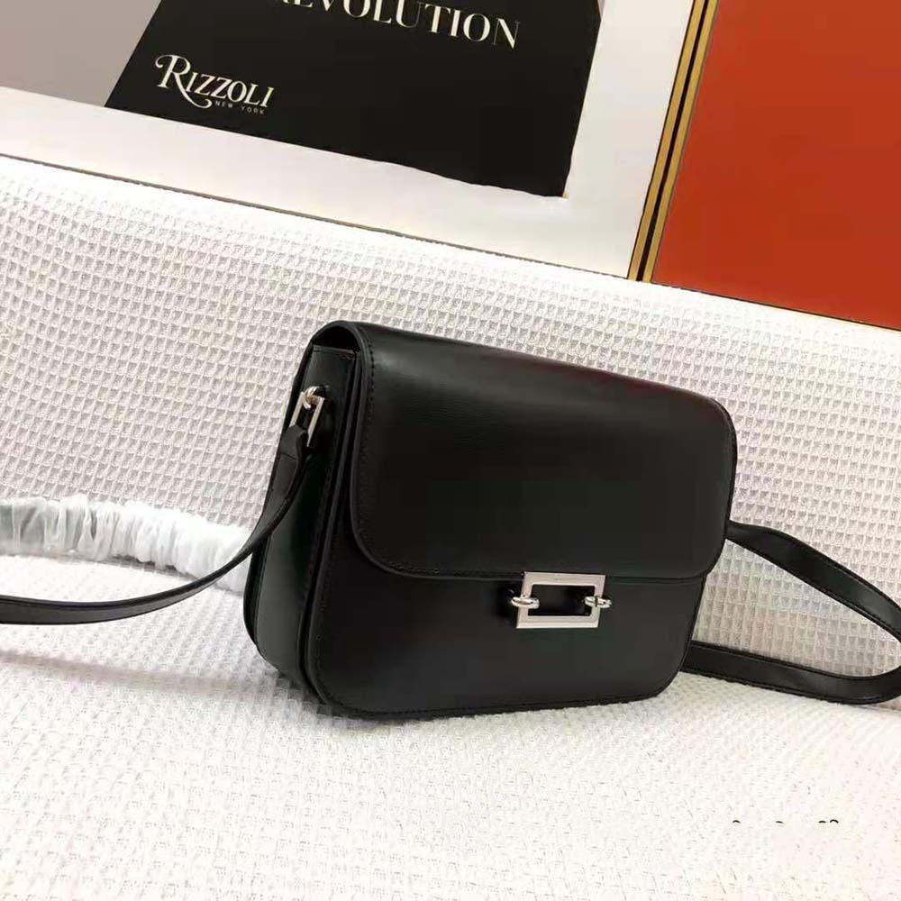 Side angle showing smooth leather texture on Saint Laurent YSL satchel