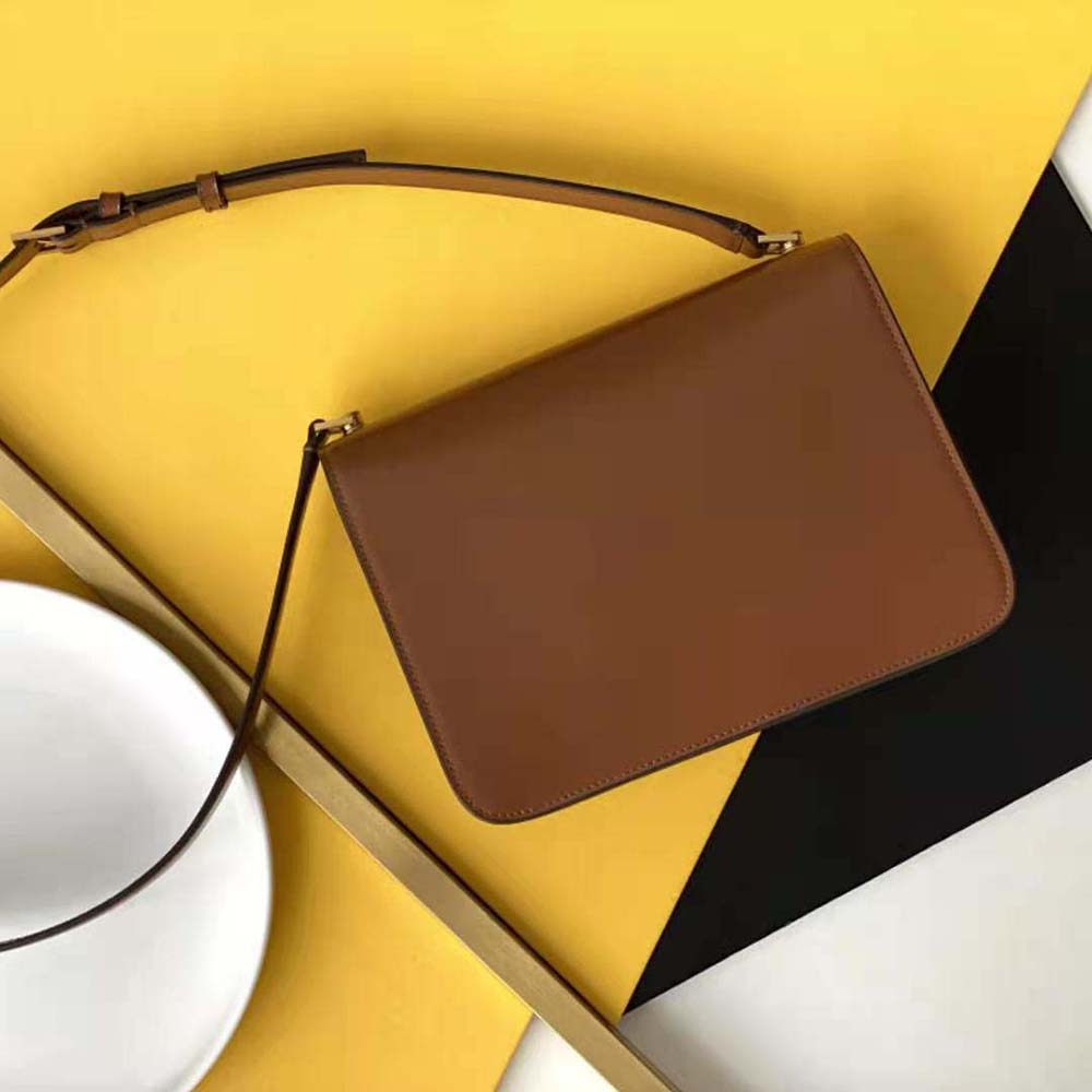 Side angle showing structured silhouette of Saint Laurent YSL Le Carre Satchel