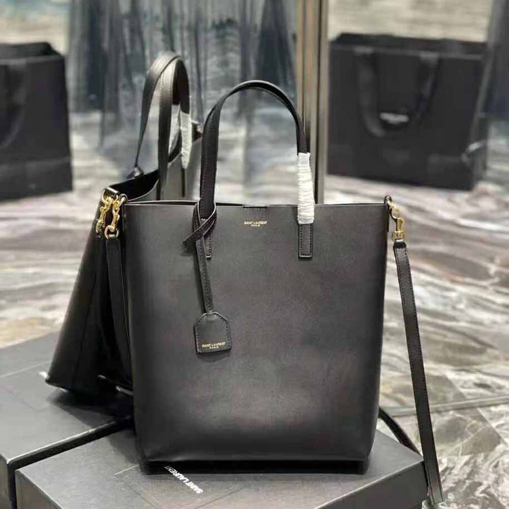 Close-up of gold-tone YSL logo and chain on Saint Laurent Toy bag