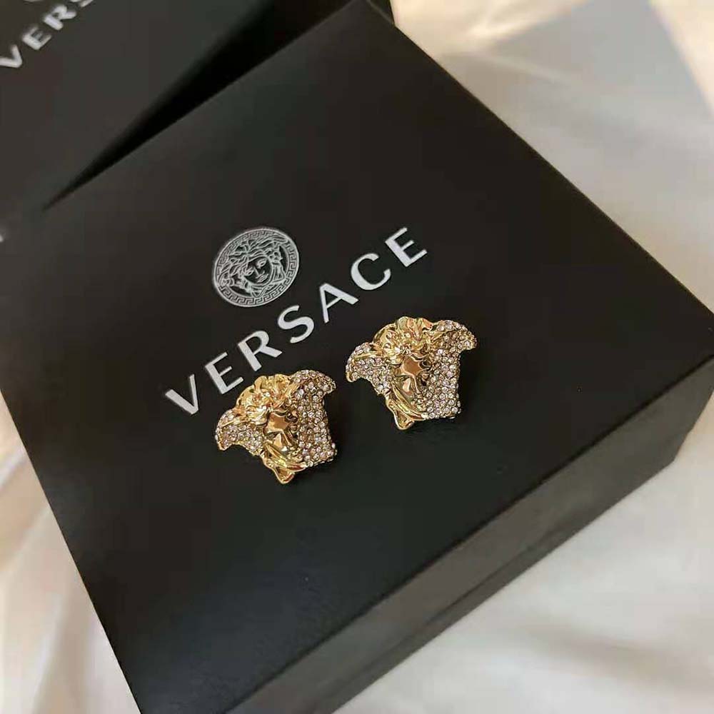 Detailed shot of crystal embellishments on Versace Women Palazzo Dia Crystal Earrings-Gold