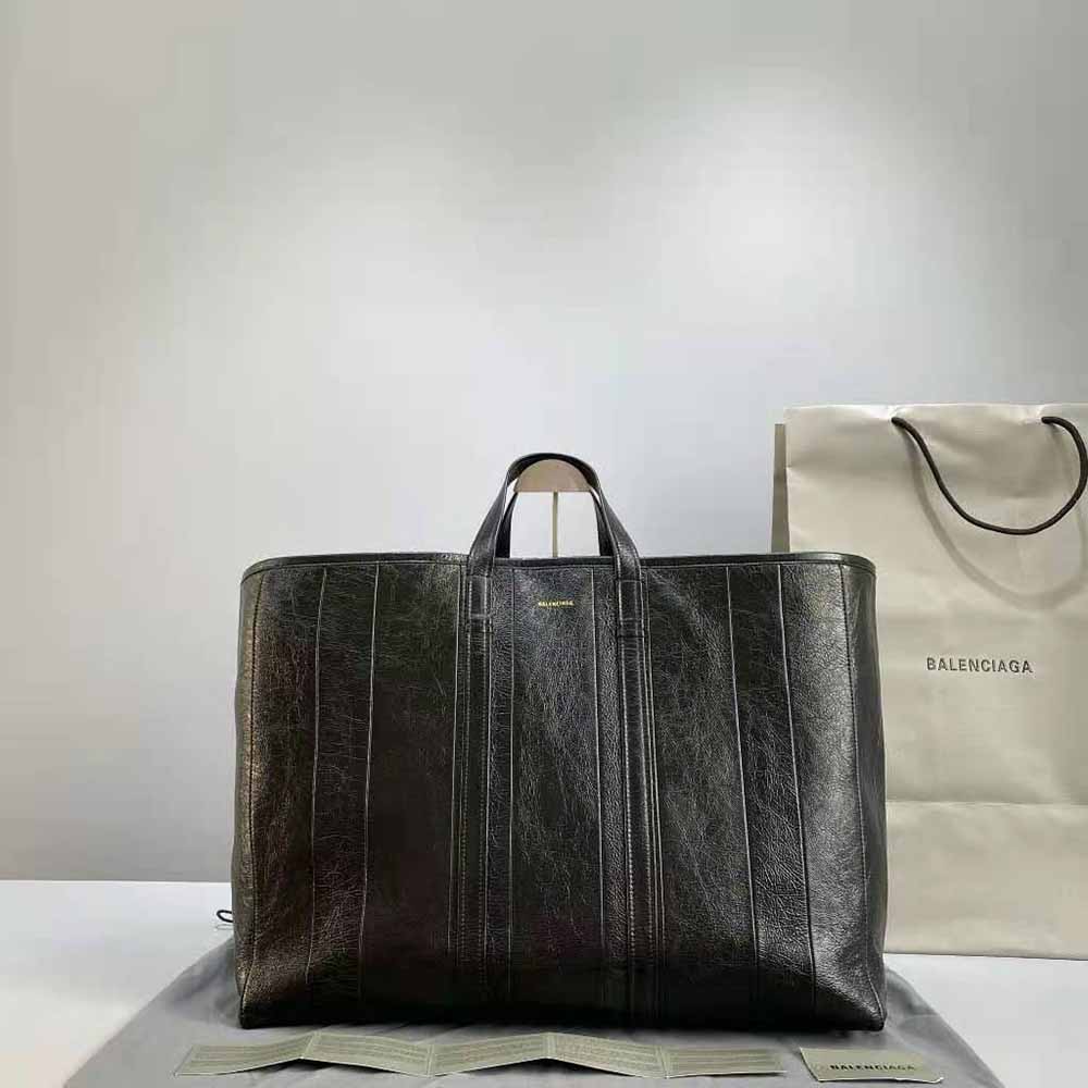 Close-up of gold-tone hardware on Balenciaga Women Barbes Shopper Bag