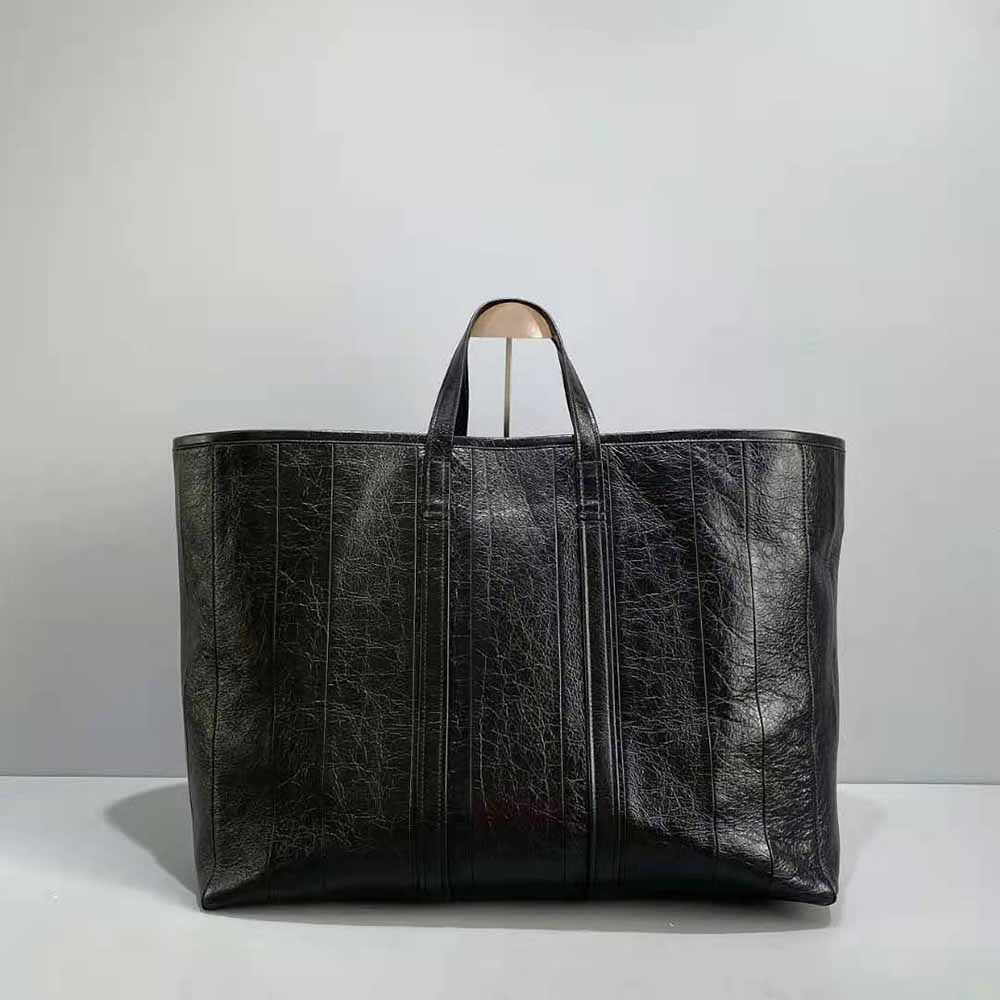 Side profile showcasing silhouette of Balenciaga Women Barbes Large East-West Shopper Bag