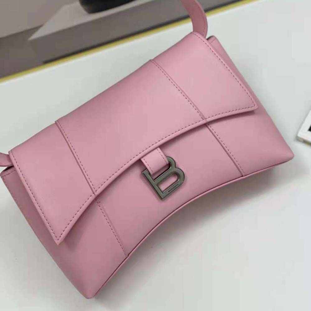 Side angle showing adjustable strap on Balenciaga Women Downtown Small Shoulder Bag in Pink