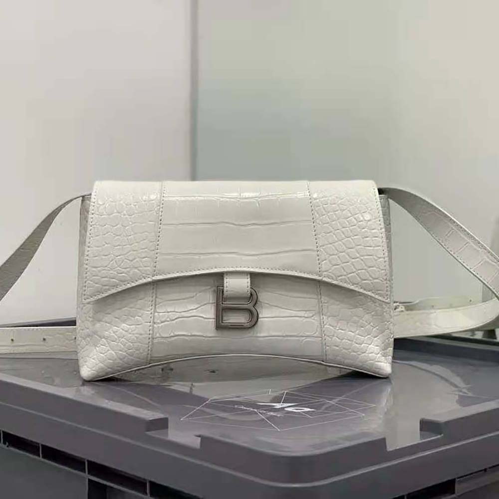 Close-up of silver hardware and flap closure on Balenciaga bag