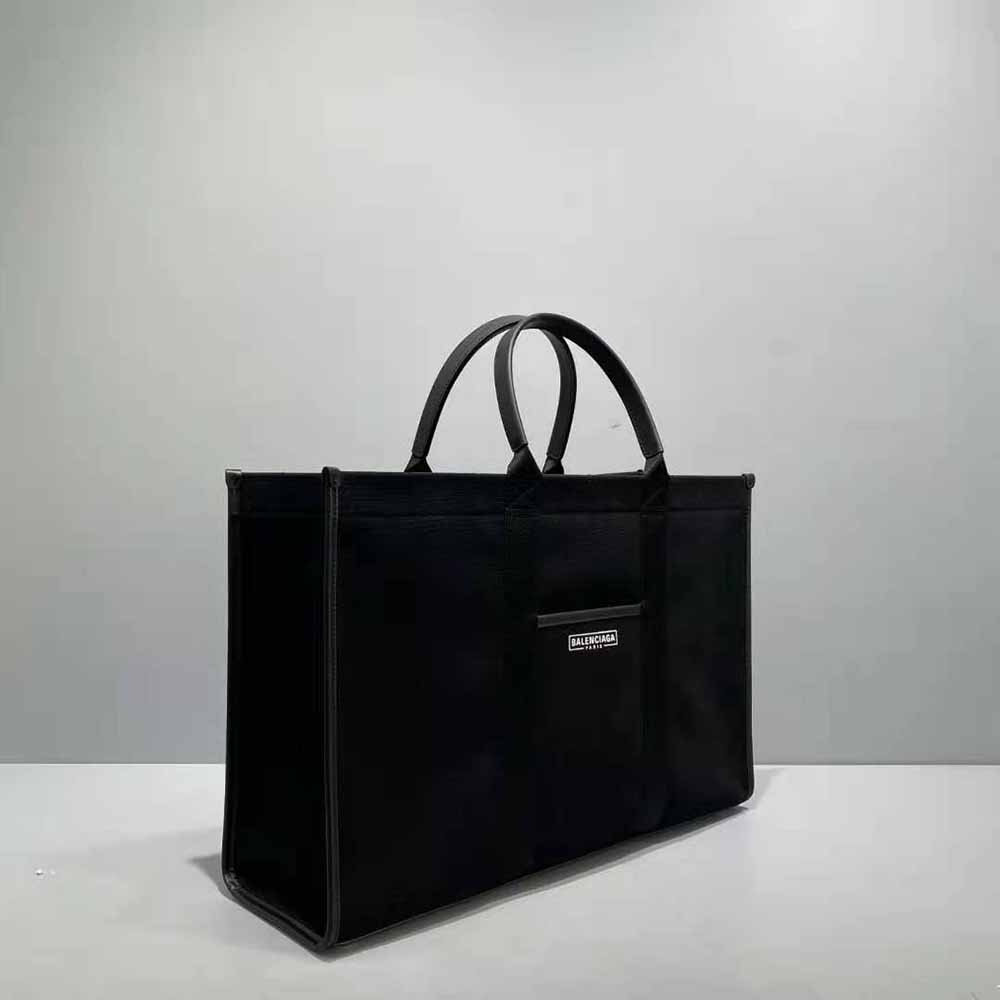 Side angle highlighting smooth black leather texture of Balenciaga Women Hardware Large Tote Bag-Black