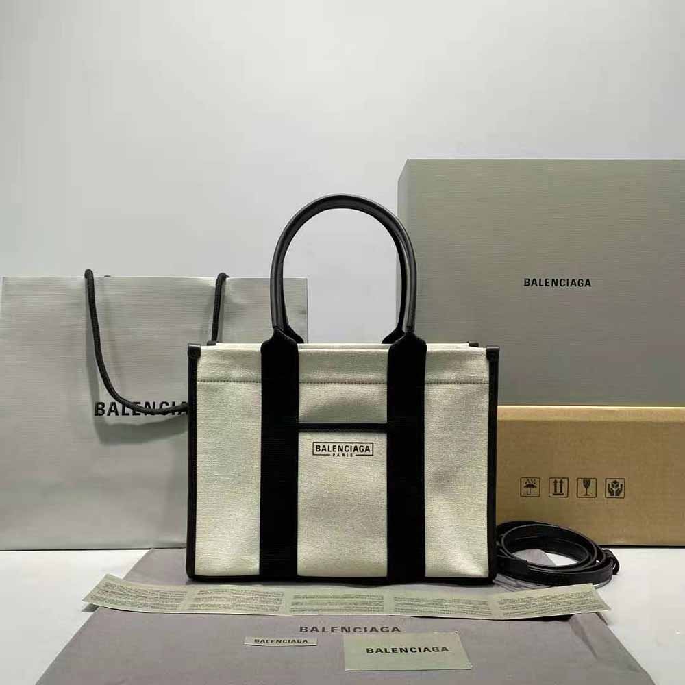 Close-up detail of silver hardware on Balenciaga white small tote