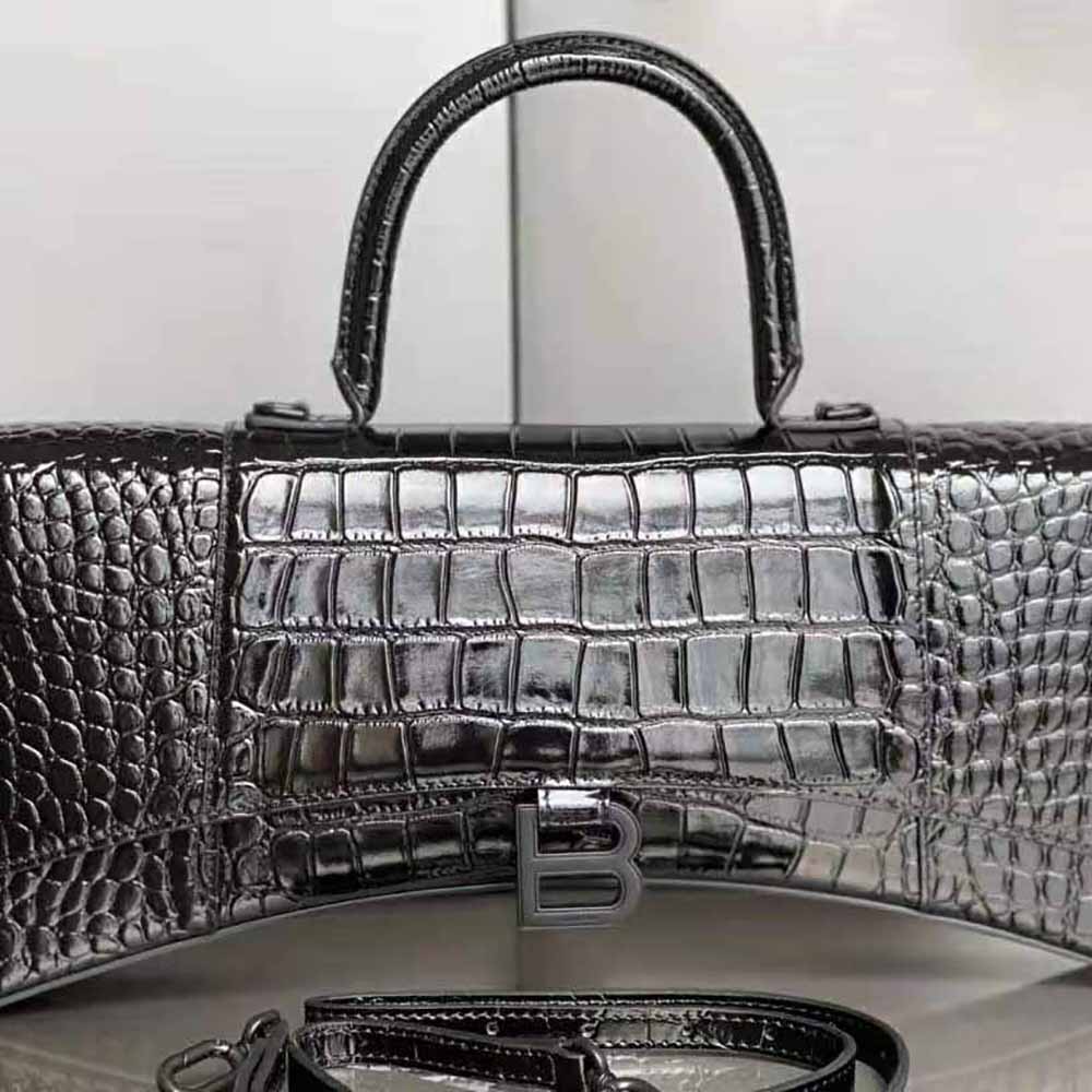 Close-up on silver hardware detail of Balenciaga Hourglass Top Handle Bag