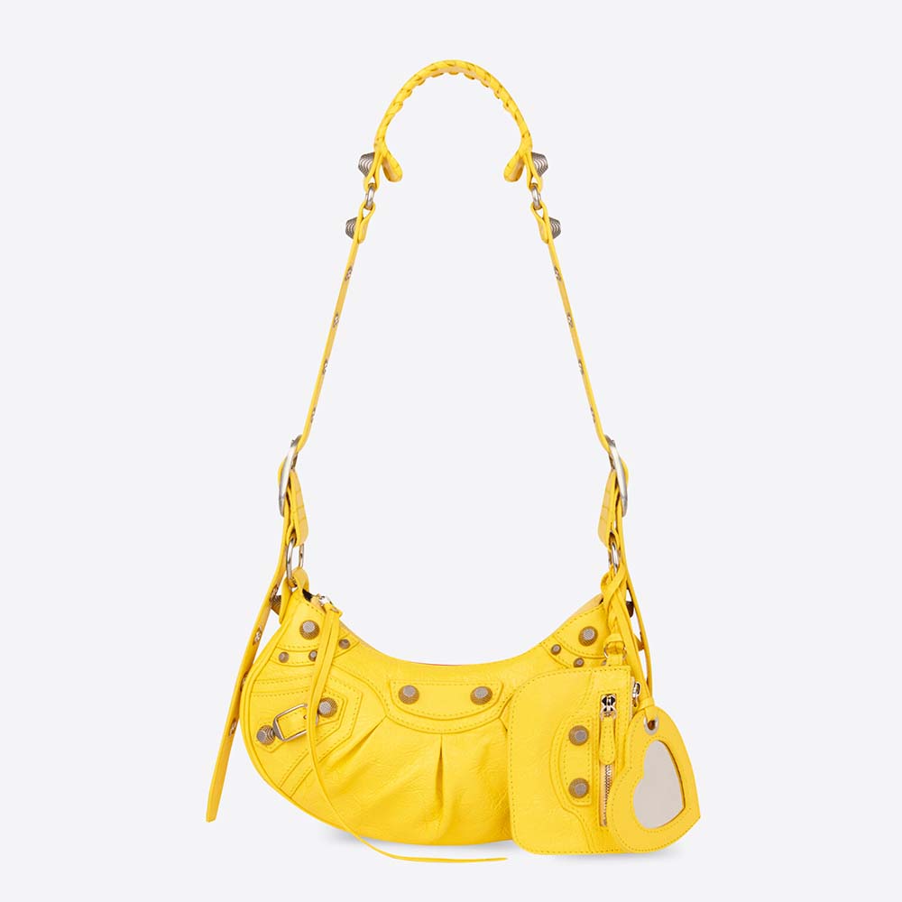 Front view of Balenciaga Women Le Cagole XS Shoulder Bag in Yellow