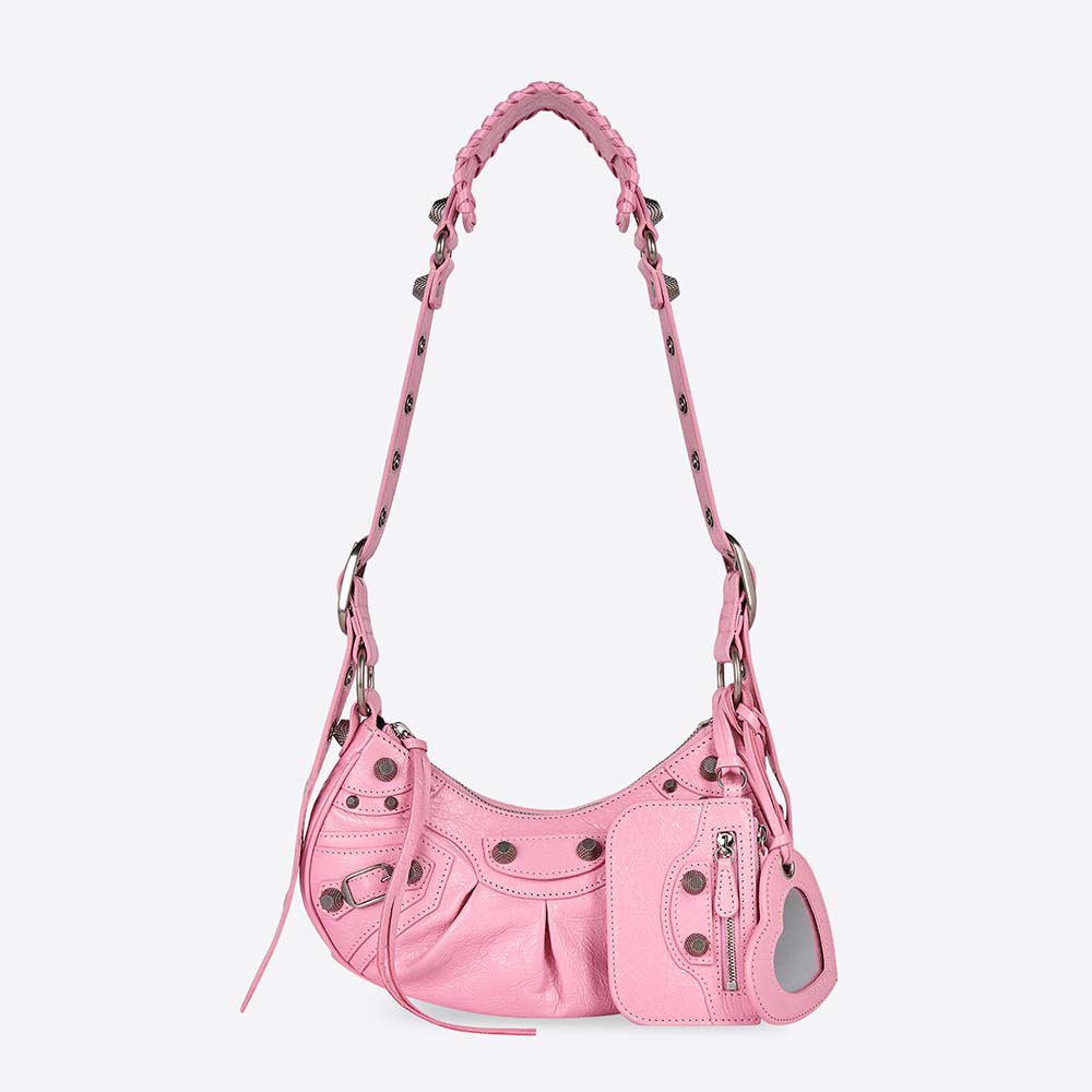 Front angle of Balenciaga Women Le Cagole XS Shoulder Bag-Pink highlighting buckle