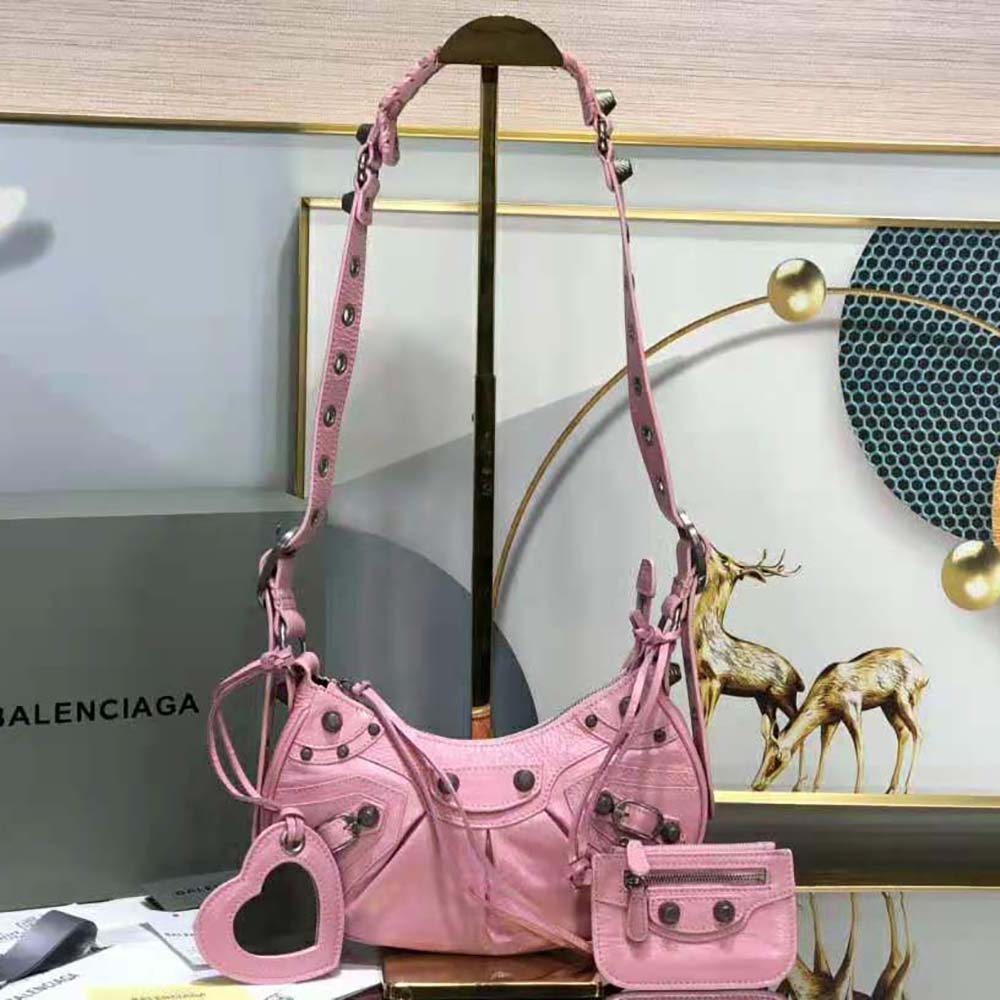Close-up of pink grained leather and silver hardware on Balenciaga bag