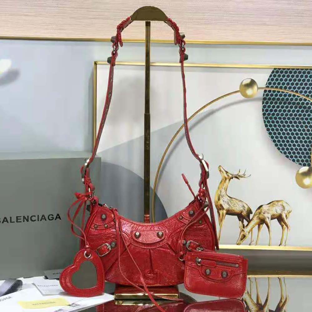 Close-up of aged brass hardware on Balenciaga Women Le Cagole XS Shoulder Bag