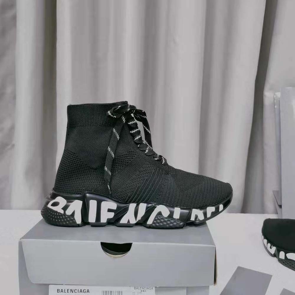Close-up on lace closure and graffiti print of Balenciaga Women Speed Lace up Graffiti Sneaker