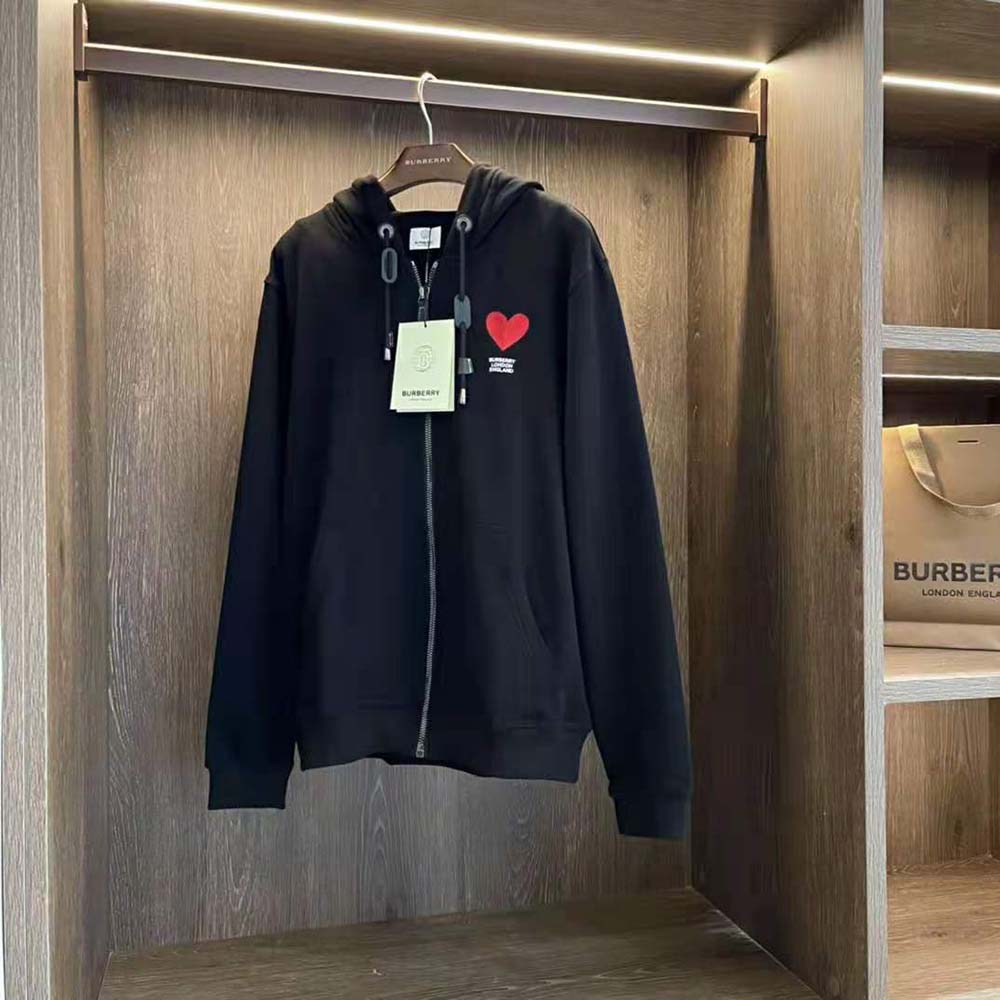 Close-up of heart motif detail on Burberry cotton hooded top