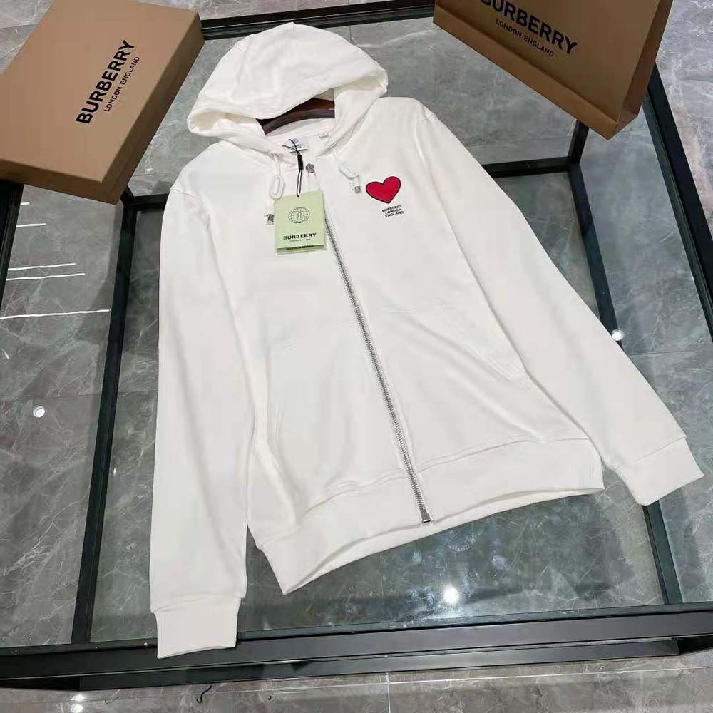Close-up of heart motif and zip on Burberry Men Hooded Top-White