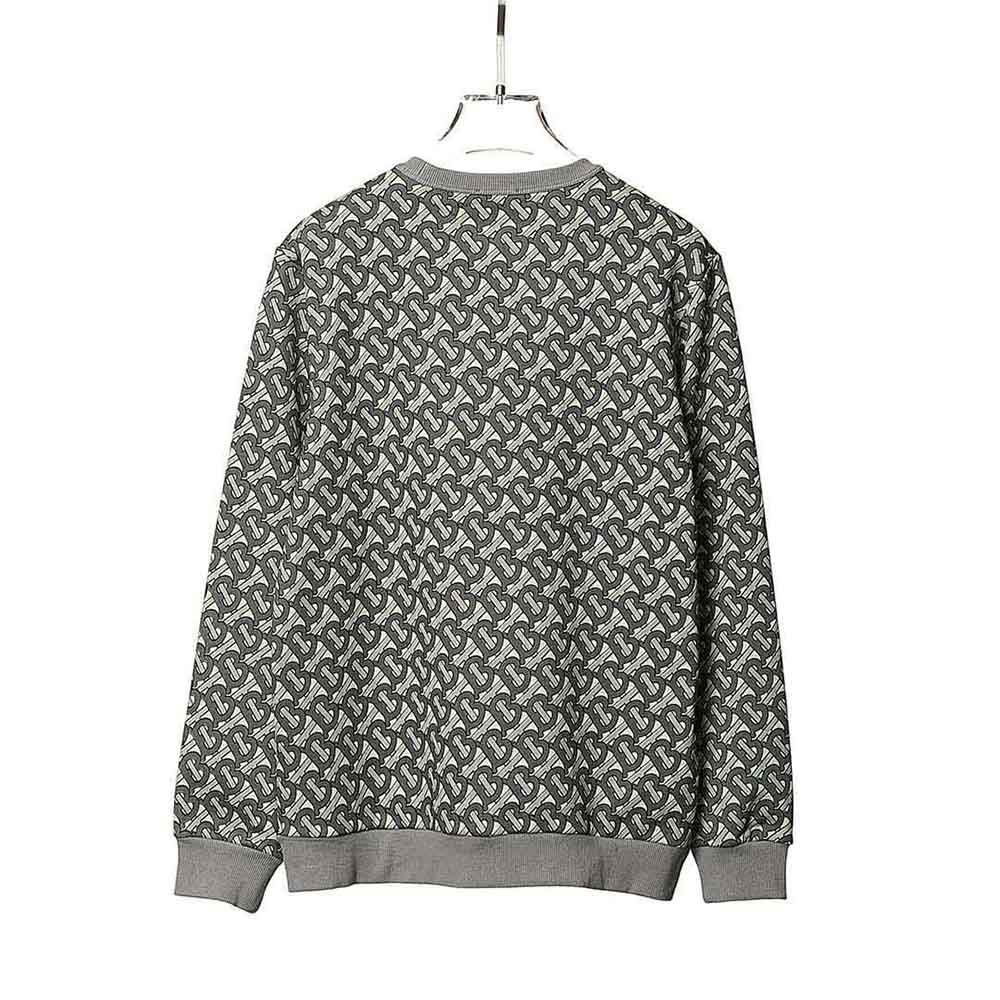 Side angle showing relaxed fit of Burberry Women Monogram Print Cotton Sweatshirt