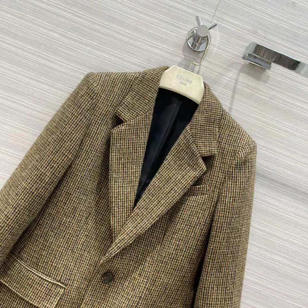 Close-up of gold-tone buttons on Celine Women Classic Jacket