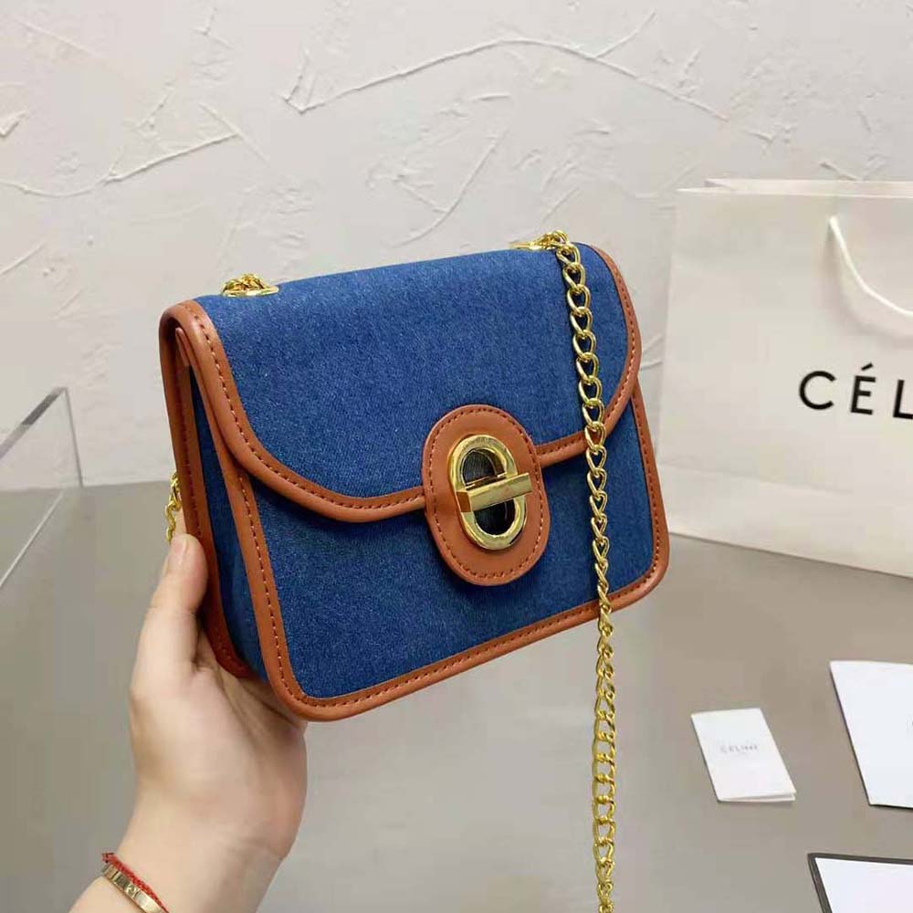 Side angle showing slim silhouette of Celine Women Clutch Sulky in Denim and Calfskin