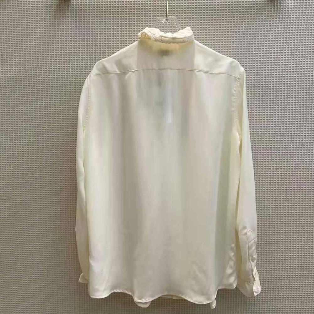 Side angle of Celine Women Loose Shirt showing loose silhouette and buttons