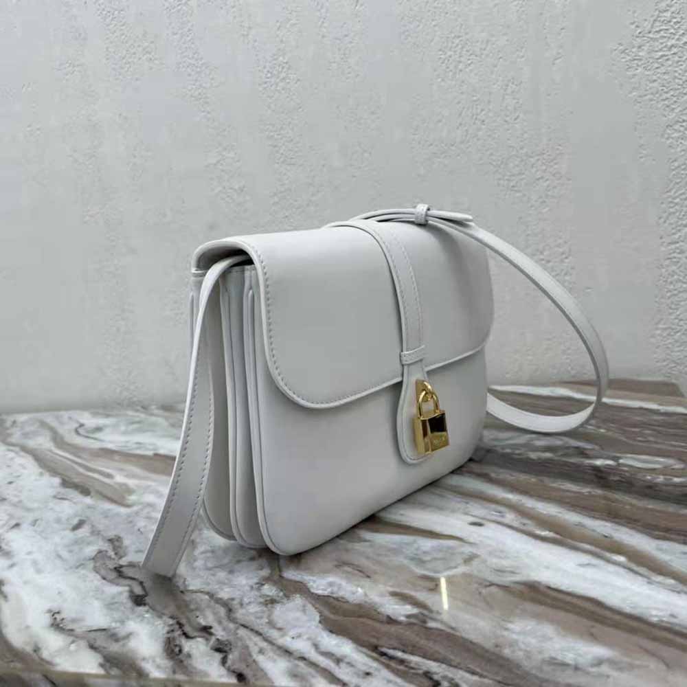 Side profile showing silhouette of Celine Women Medium Tabou in White