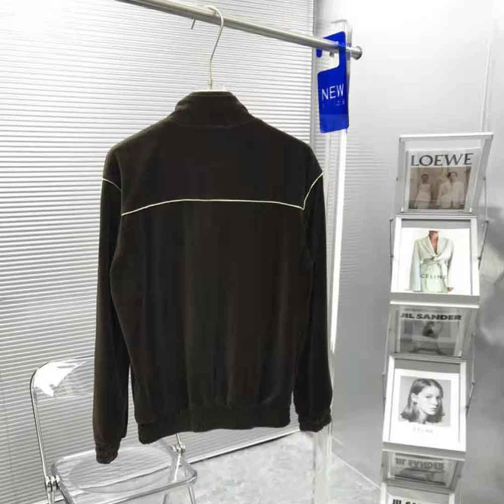 Side angle showing ribbed cuff and sleeve details of Celine sweatshirt