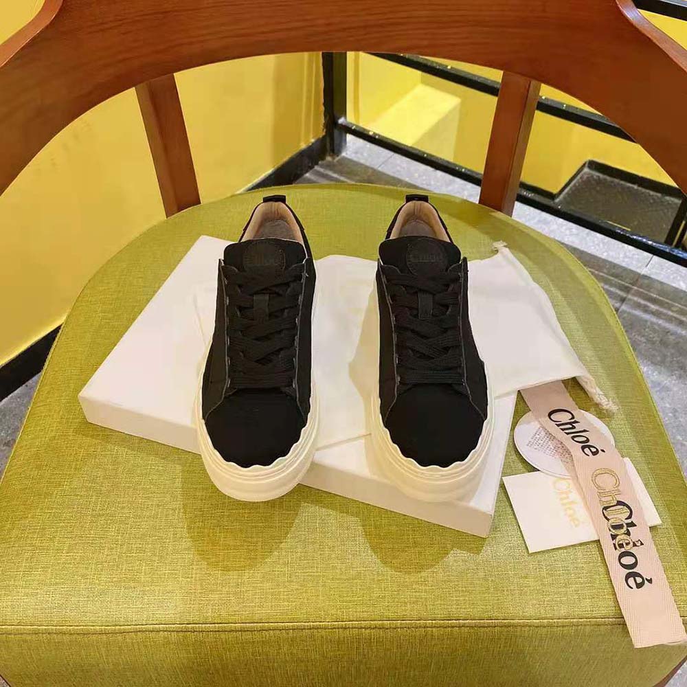 Close-up detail of black embroidered canvas on Chloe Women Lauren Sneaker