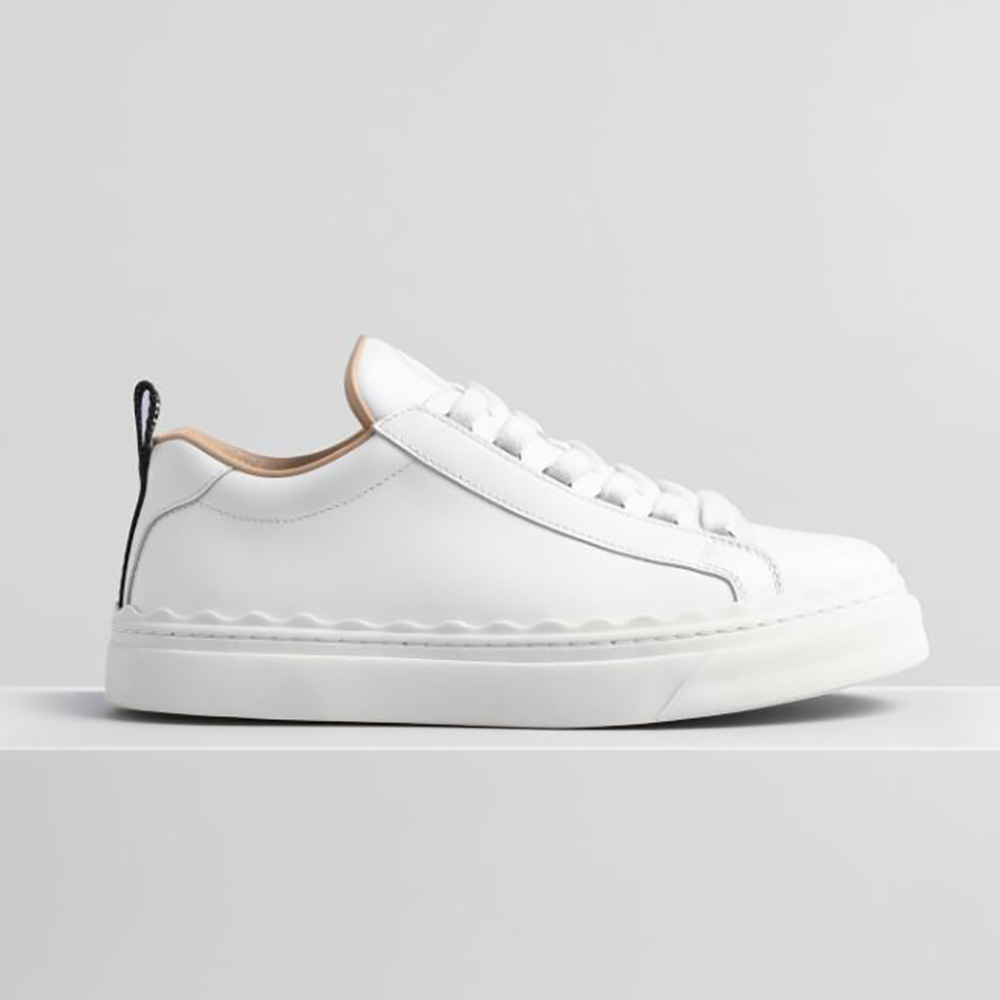 Side angle of Chloe Women Lauren Sneaker in smooth white calfskin