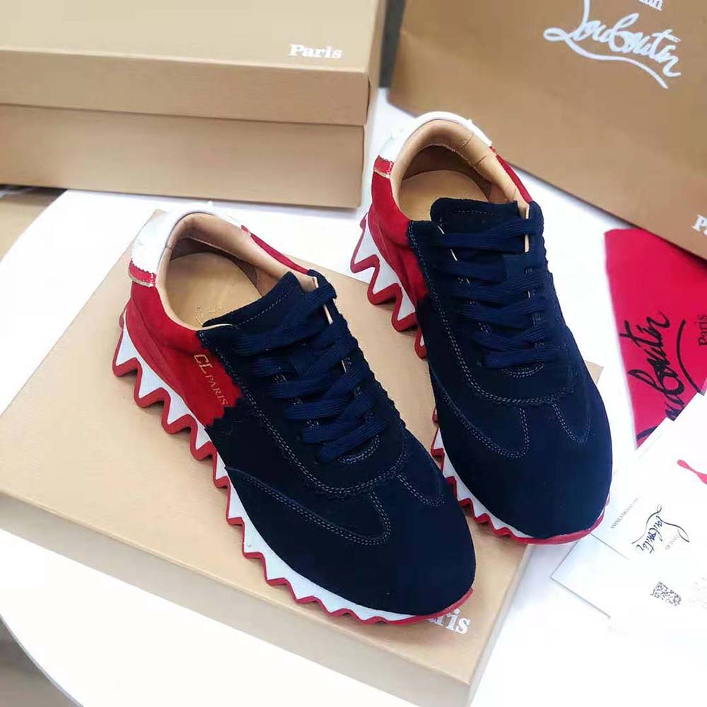 Top-down look at laces and navy leather on Christian Louboutin Women Loubishark Flat-Navy