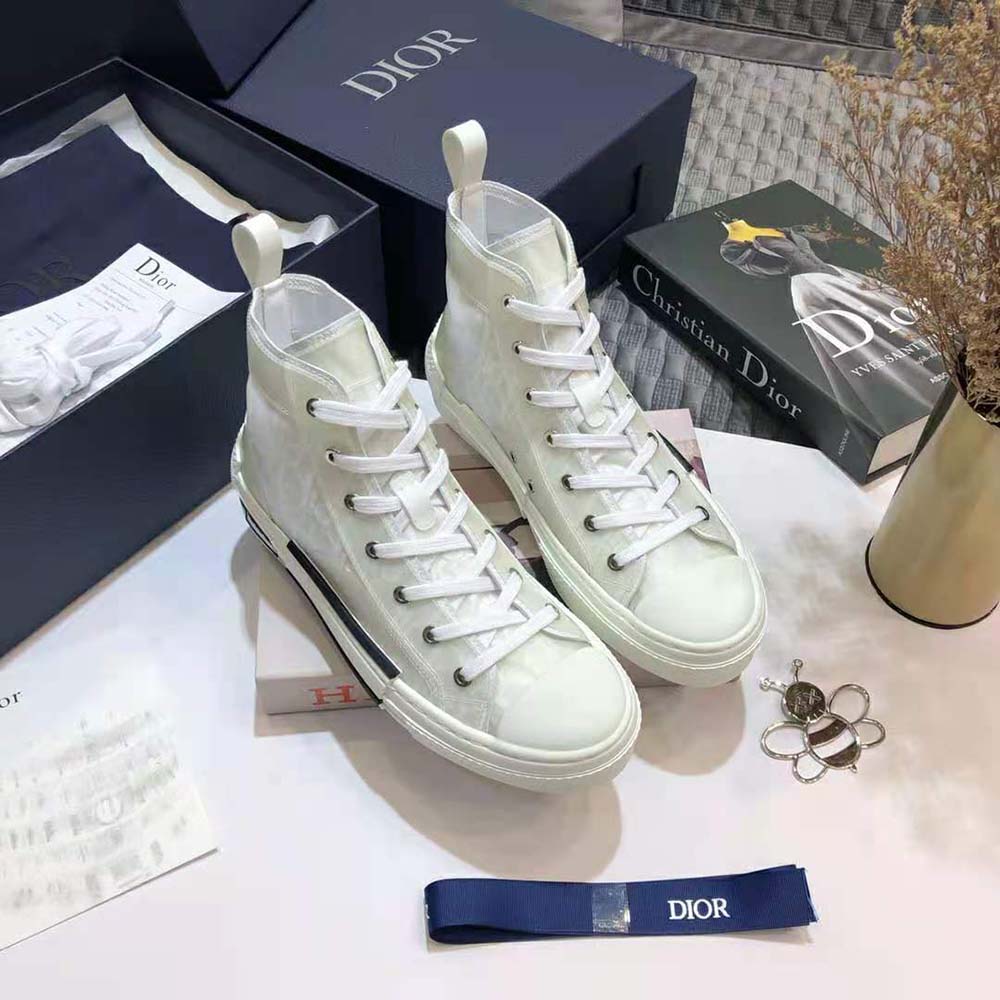 Rear view showing high-top silhouette and lace-up closure of Dior sneaker