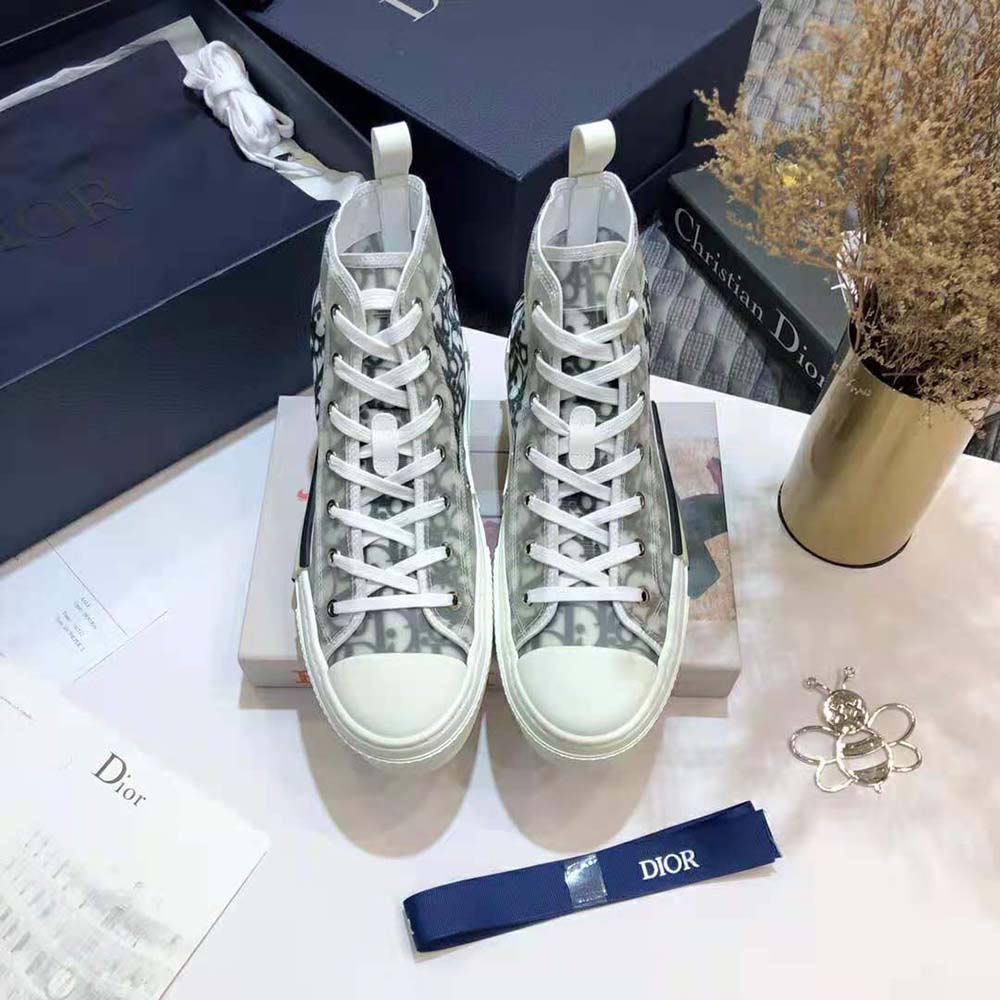Close-up of Dior Oblique canvas pattern on Dior Men B23 High-Top Sneaker