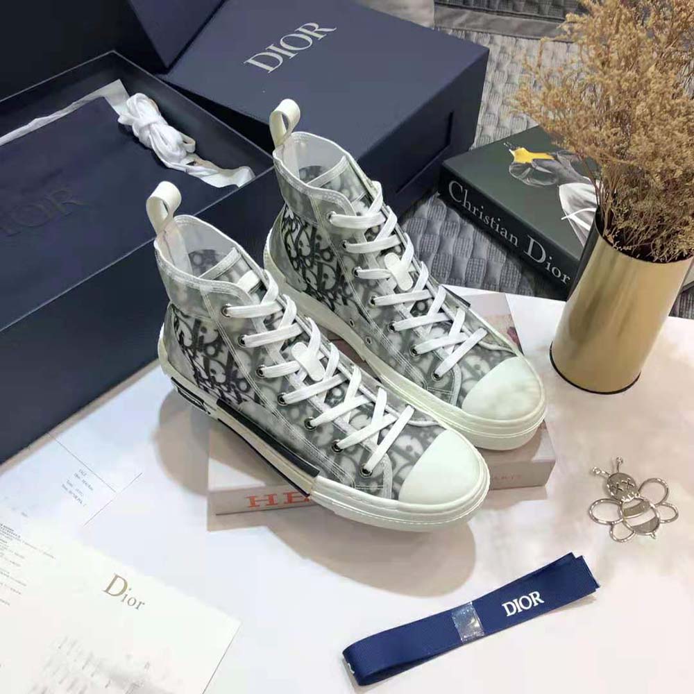 Top view showing laces and black leather details on Dior Men B23 High-Top Sneaker