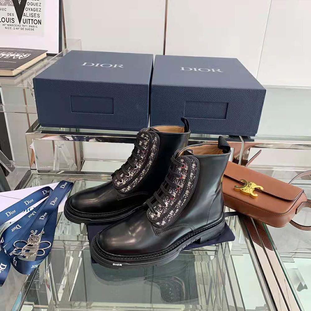 Top view showcasing the polished black calfskin texture and ankle silhouette