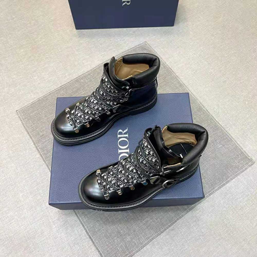 Side profile of Dior Men Explorer II ankle boot showcasing laced detail