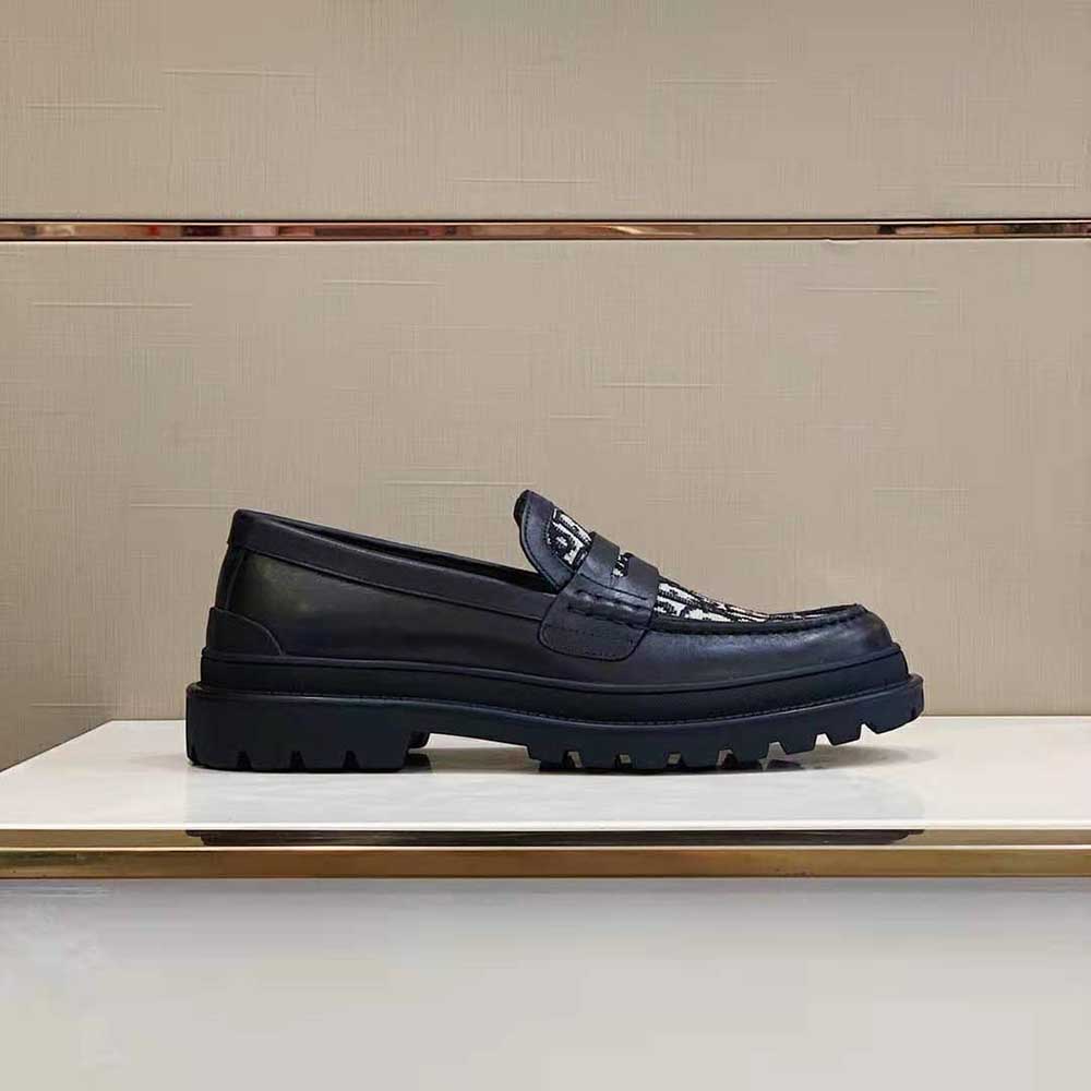 Close-up of black leather trim on Dior Men Explorer Loafer