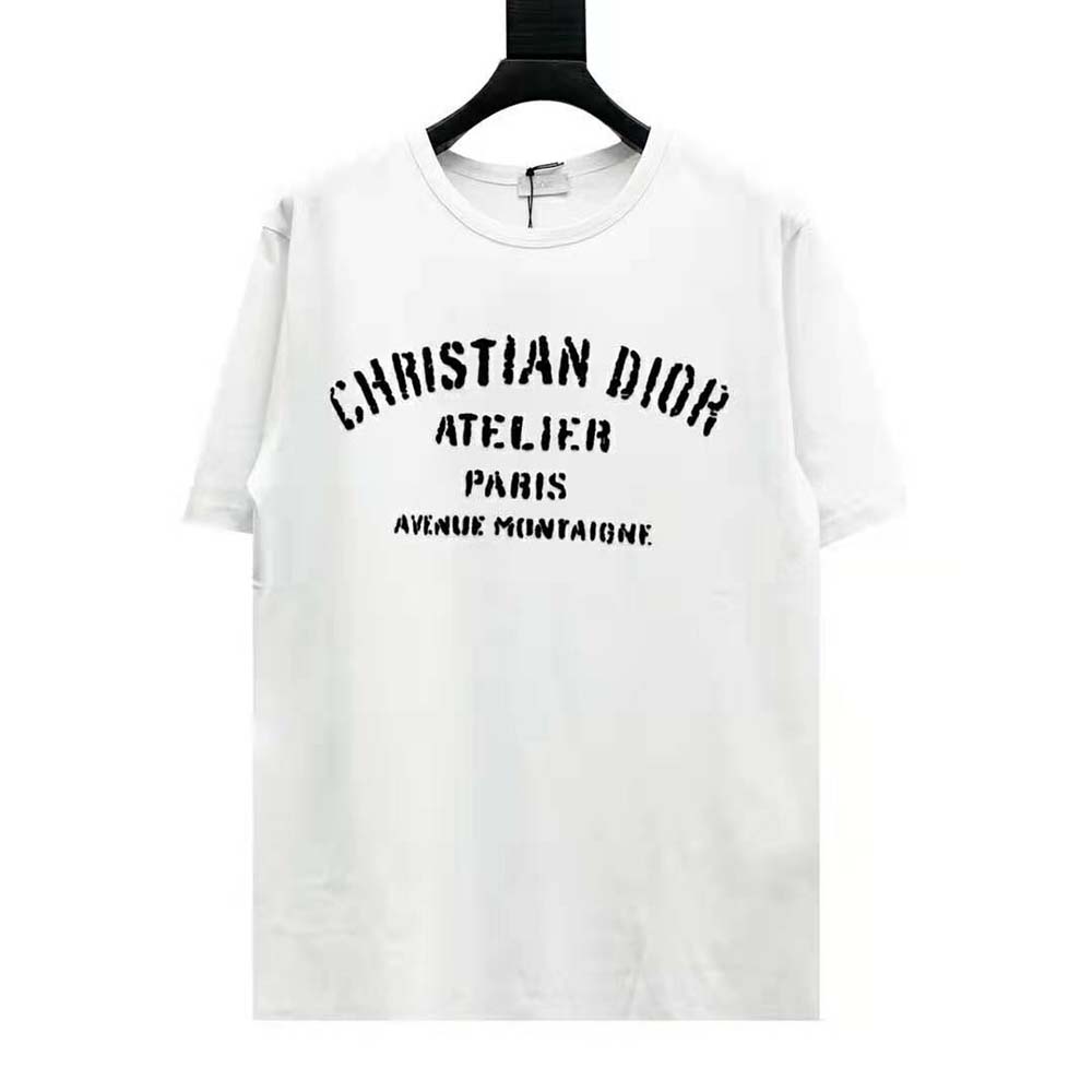 Close-up of embroidered Christian Dior Atelier detail on white cotton jersey T-shirt