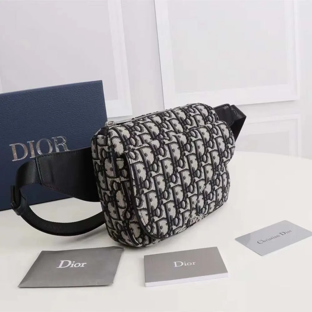 Side angle of Dior Men Saddle Belt Bag highlighting zip closure and strap