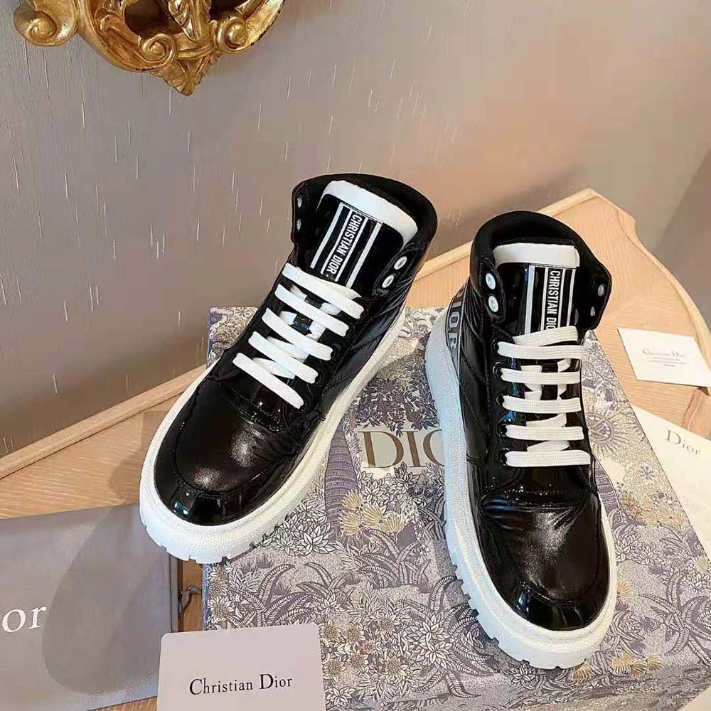 Top angle showing laces and signature Dior detail on D-Player Sneaker