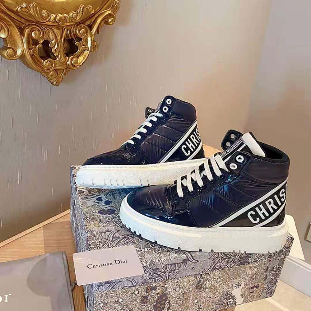 Top angle showing laces and Dior branding on D-Player Sneaker Navy Blue